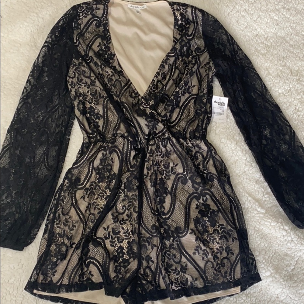Brand new black laced romper.